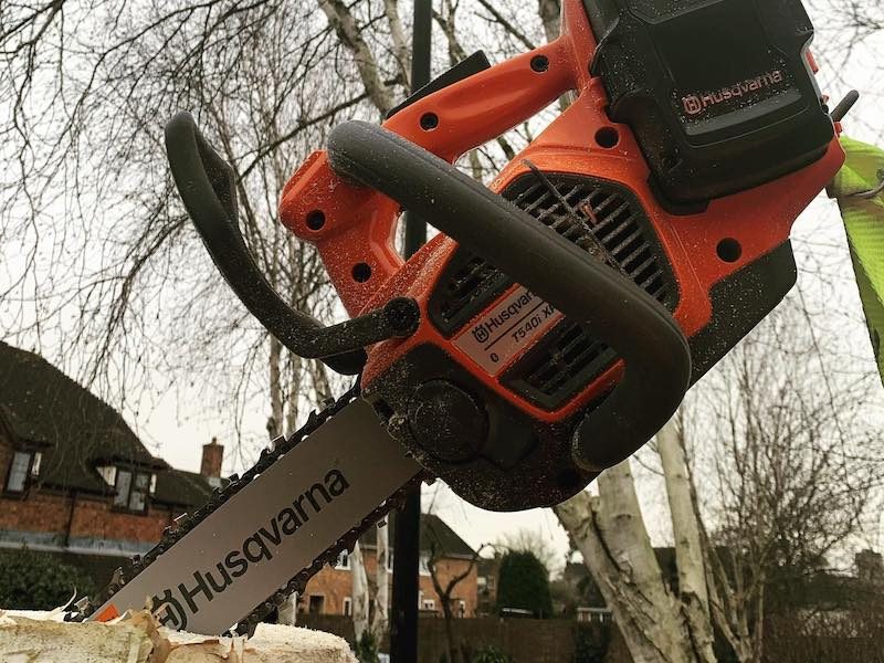 Battery powered chainsaw use for professional tree surgeons.