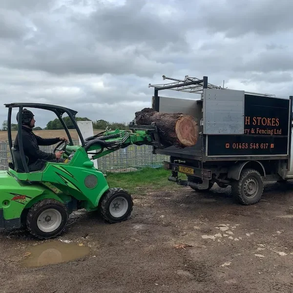 loader for loading heavy timber onto lorry